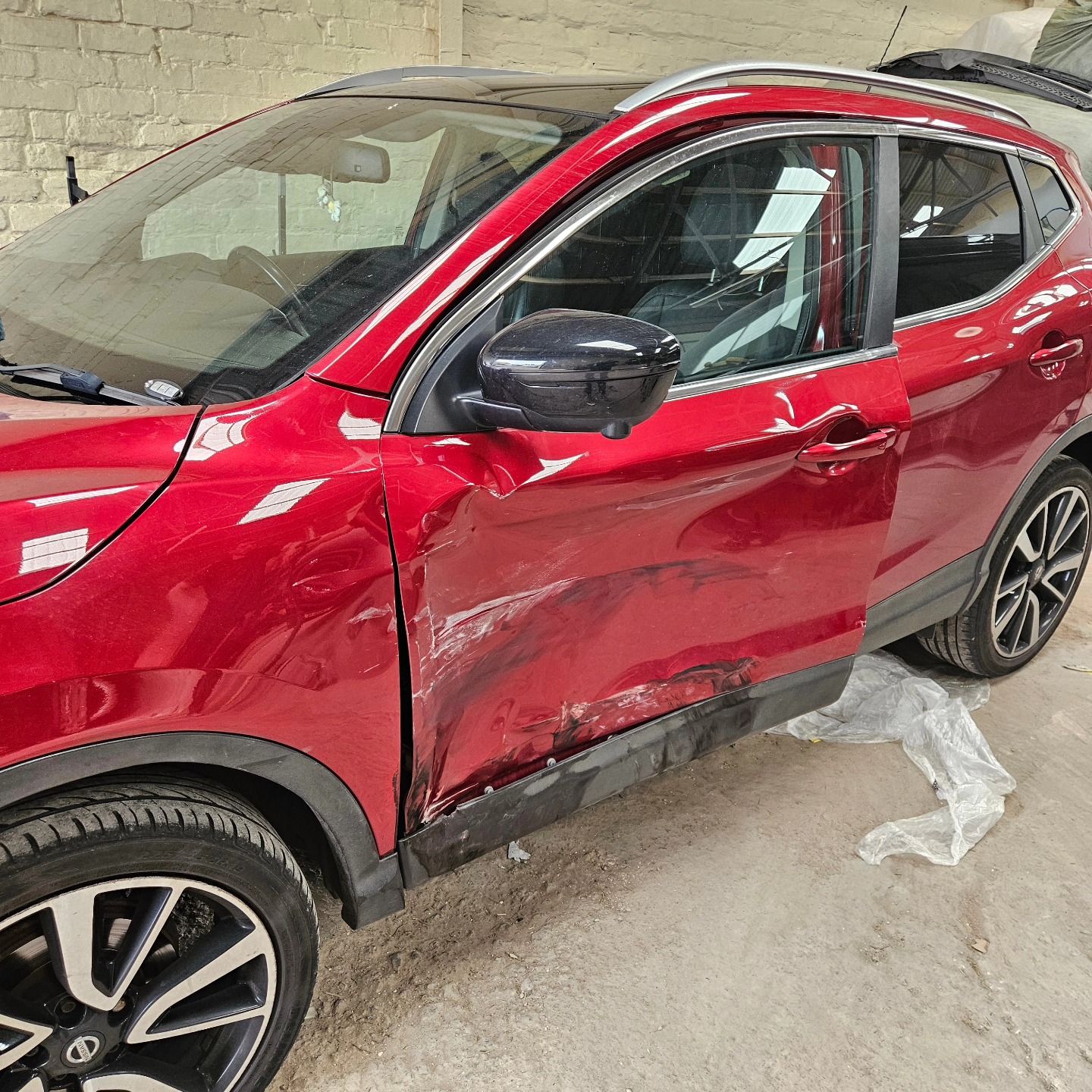 A car showing body damage.