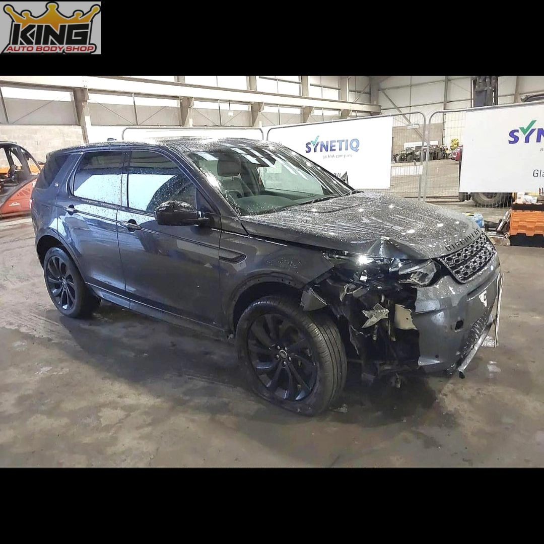 A car showing body damage.