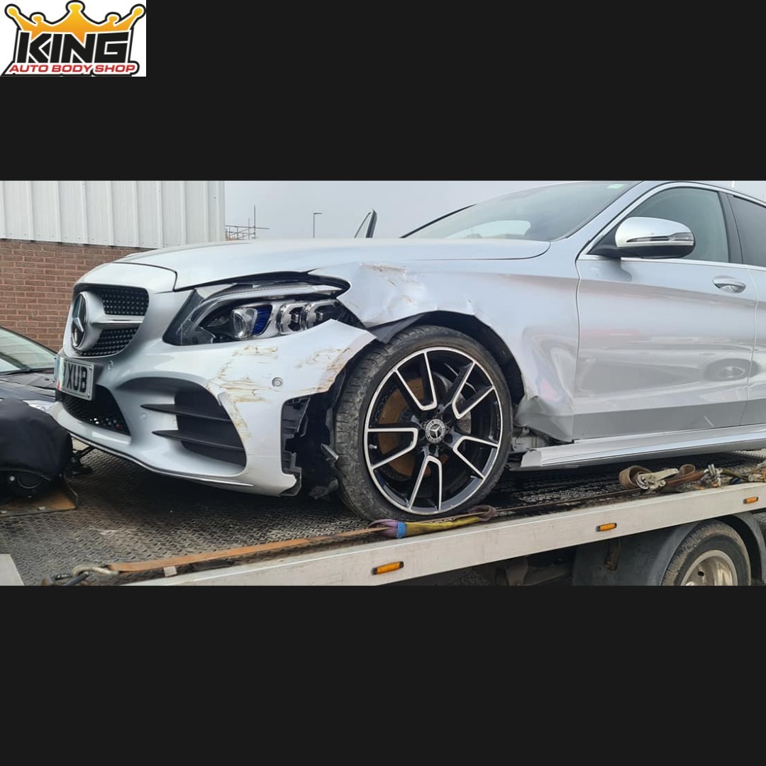 A car showing body damage.